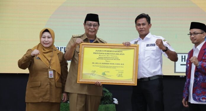 bapak pembangunan desa Paman Birin, Bapak Pembangunan Desa