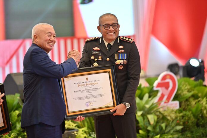 muhidin hadiri peringatan hari bhayangkara ke 79