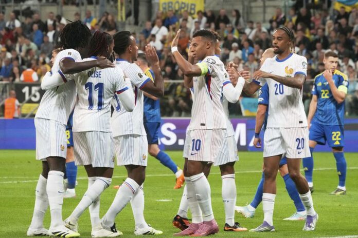 library_upload_21_2025_09_996x664_michael-olise-selebr_1f1e795 Prancis Menang Atas Ukraina di Kualifikasi Piala Dunia 2026